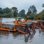 BERKY TRITON 550 in orange lined up in the water