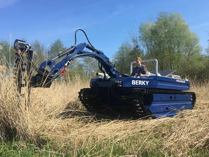 Berky Nereus Amphi on land on the shore in use with plants